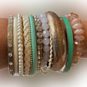 Lot of random gold tone bracelets